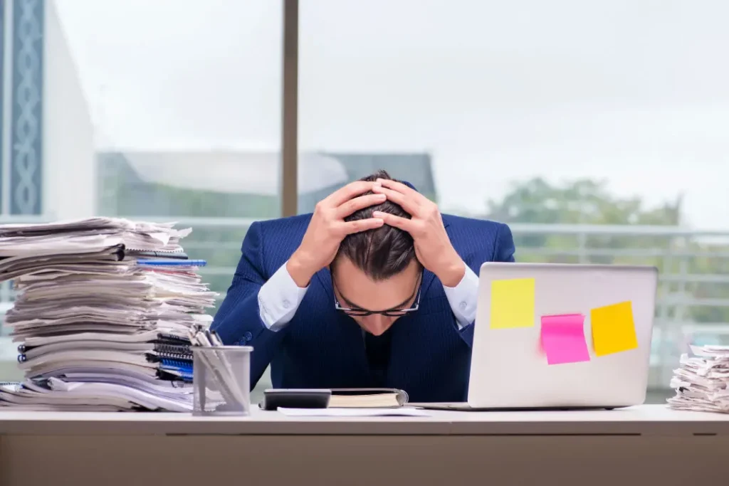 A man having office work load. 