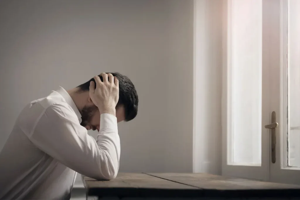 stress man sitting on table