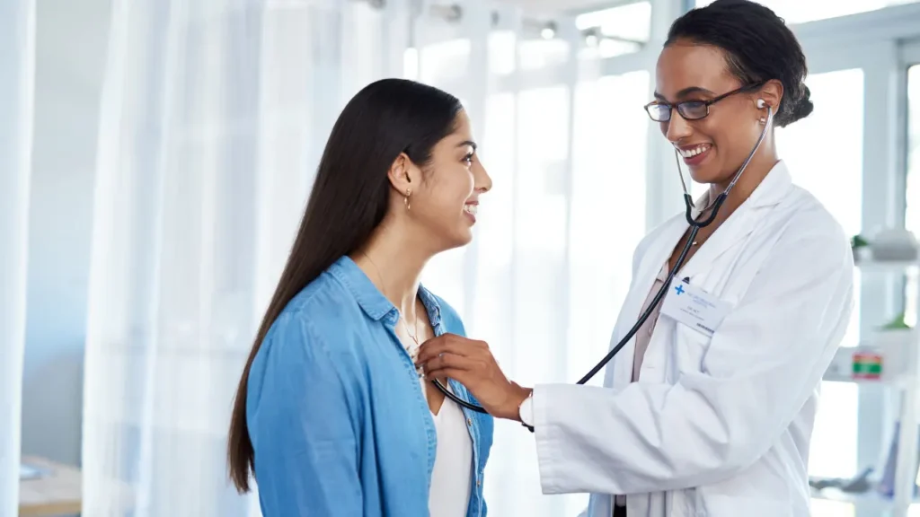 Doctor examining the patient. 