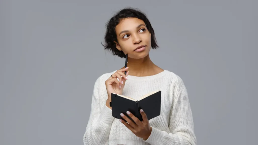 Young girl reading a book. 