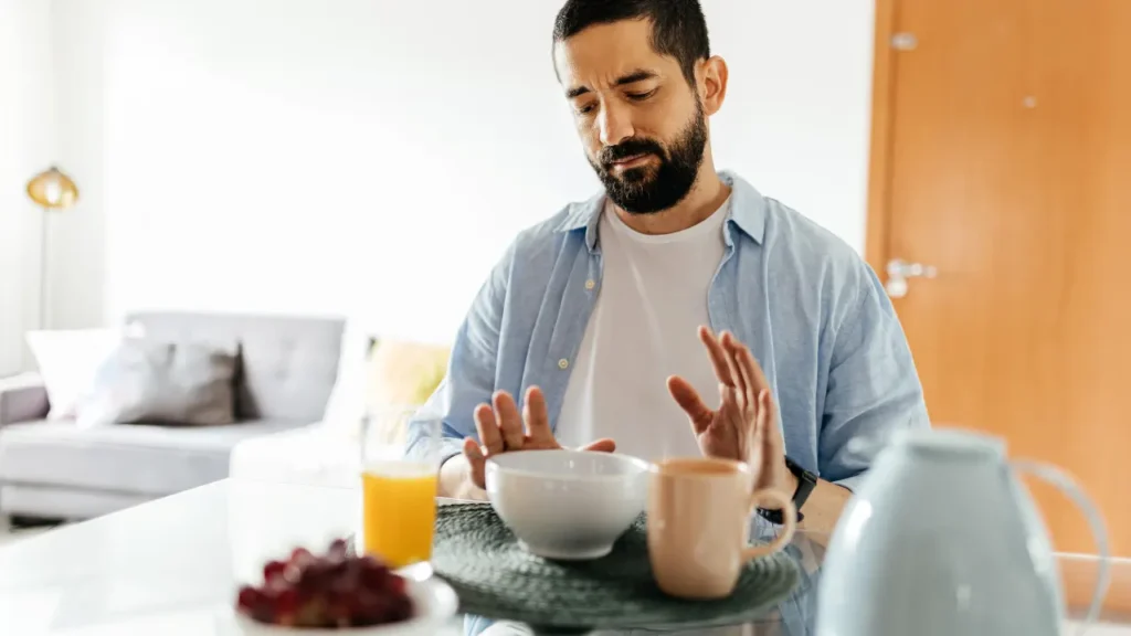 Man having appetite issues. 