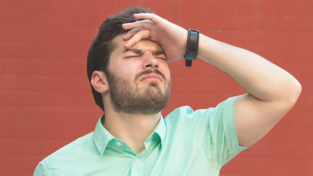 Man having headache. 